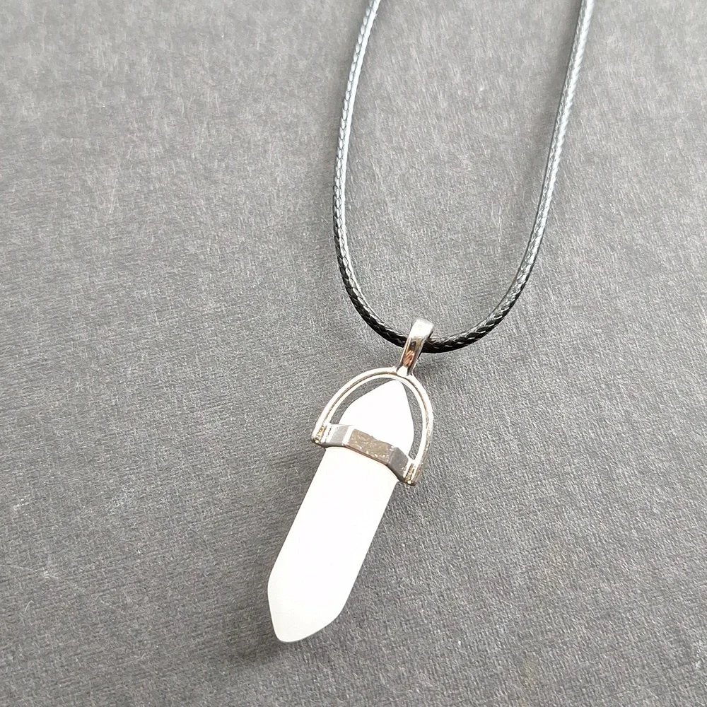 White crystal point pendant necklace on 16-inch faux leather chain